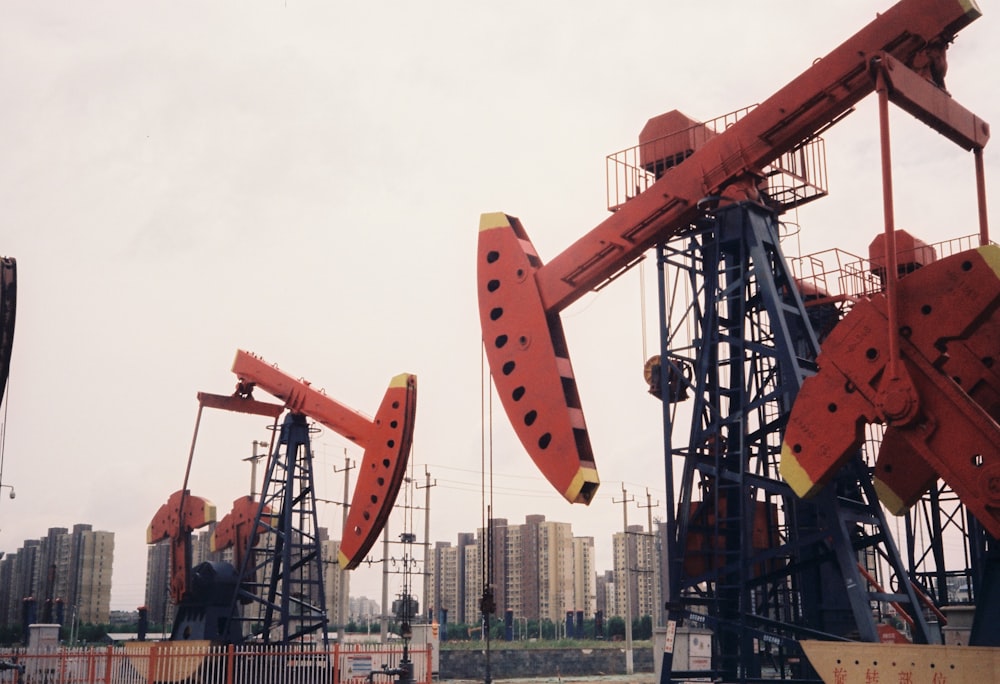 a group of oil pumps sitting next to each other