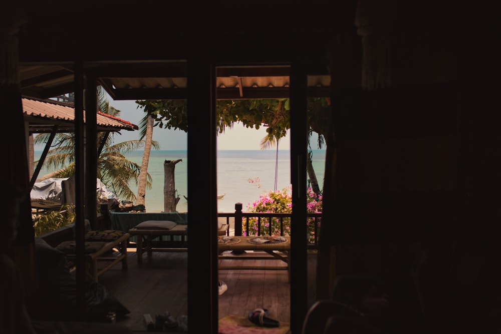 a view of the ocean from inside a house