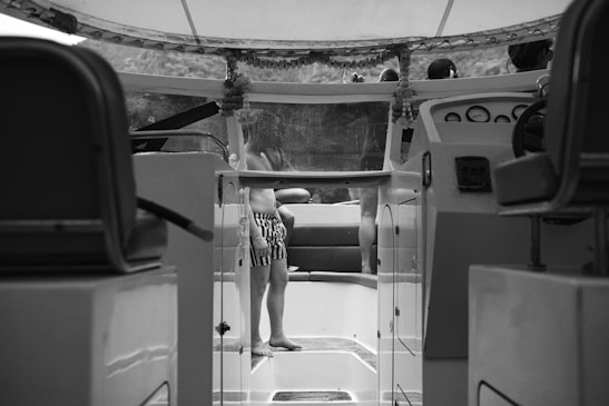 Photo of a friendly instructor teaching a small group about boating safety inside the Vero Beach Power Squadron classroom.