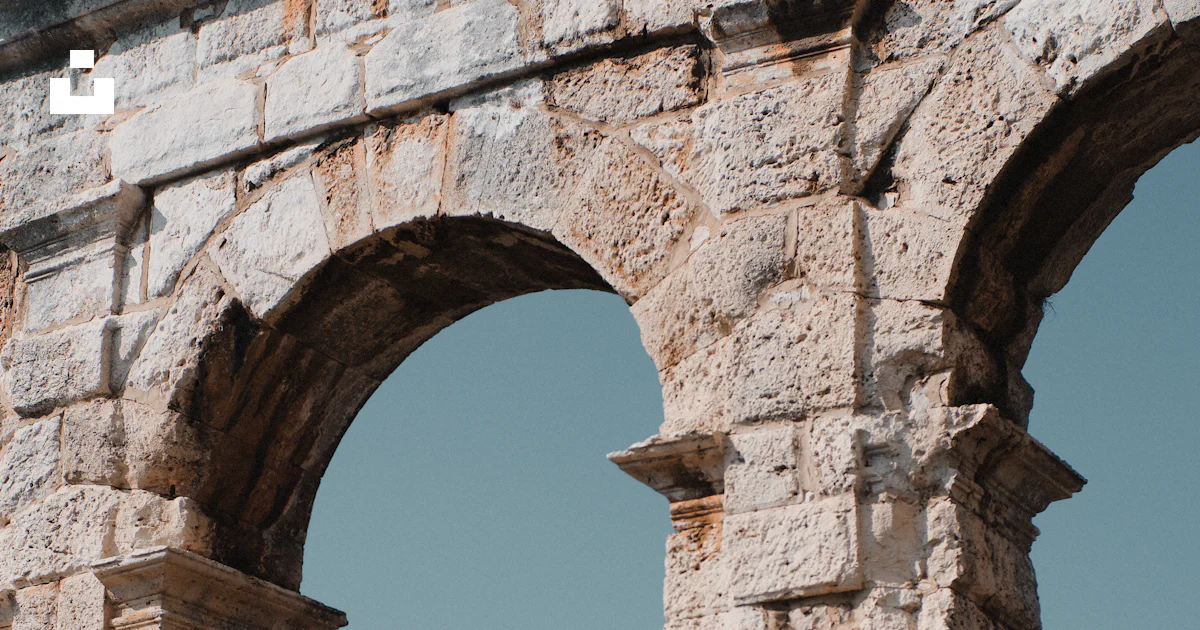 Two Arch An old stone structure with two arches photo – Free Architecture Image ...