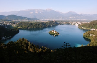 A serene lake surrounded by lush greenery in the Balkans.