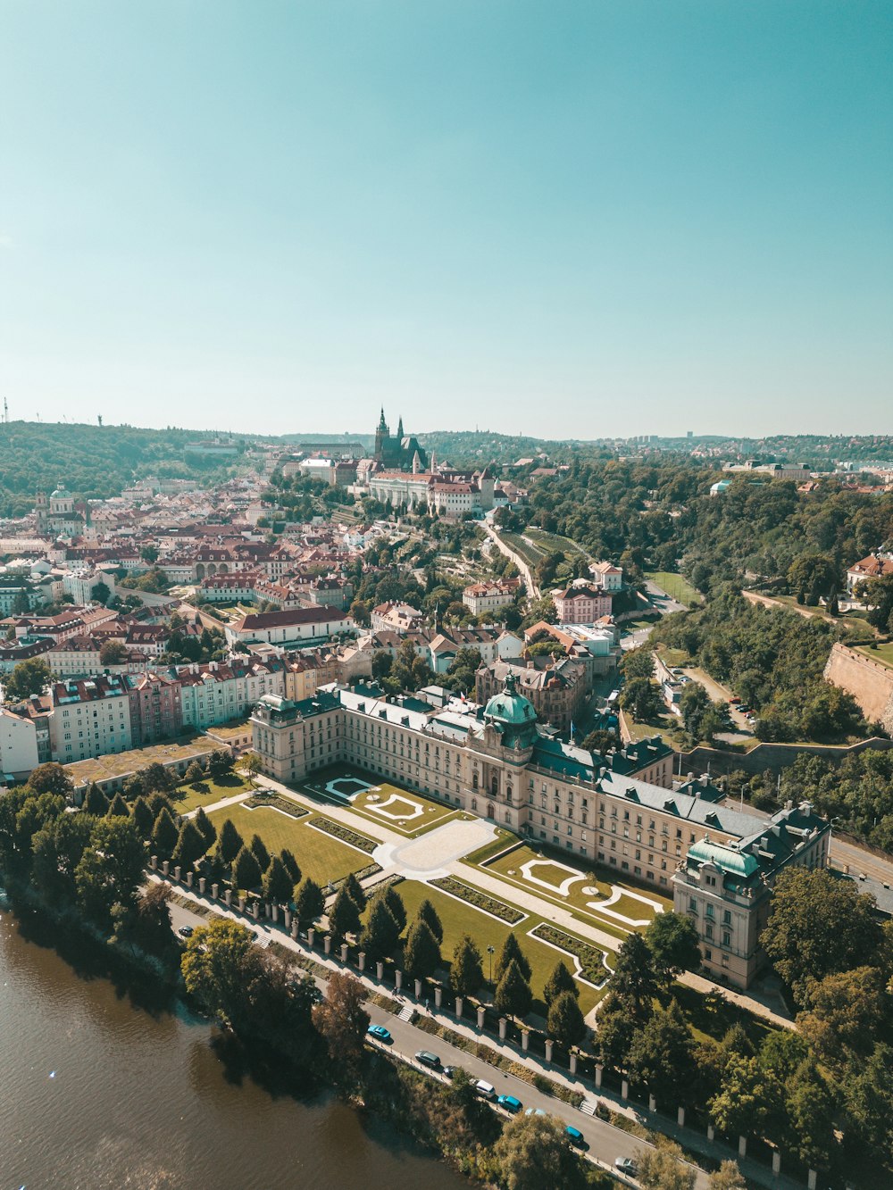 a bird's eye view of a city with a river running through it