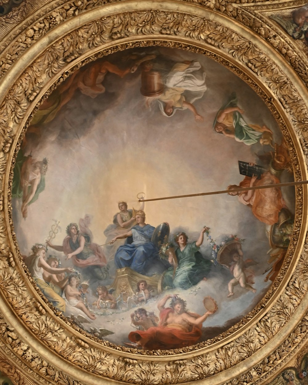 a painting on the ceiling of a building