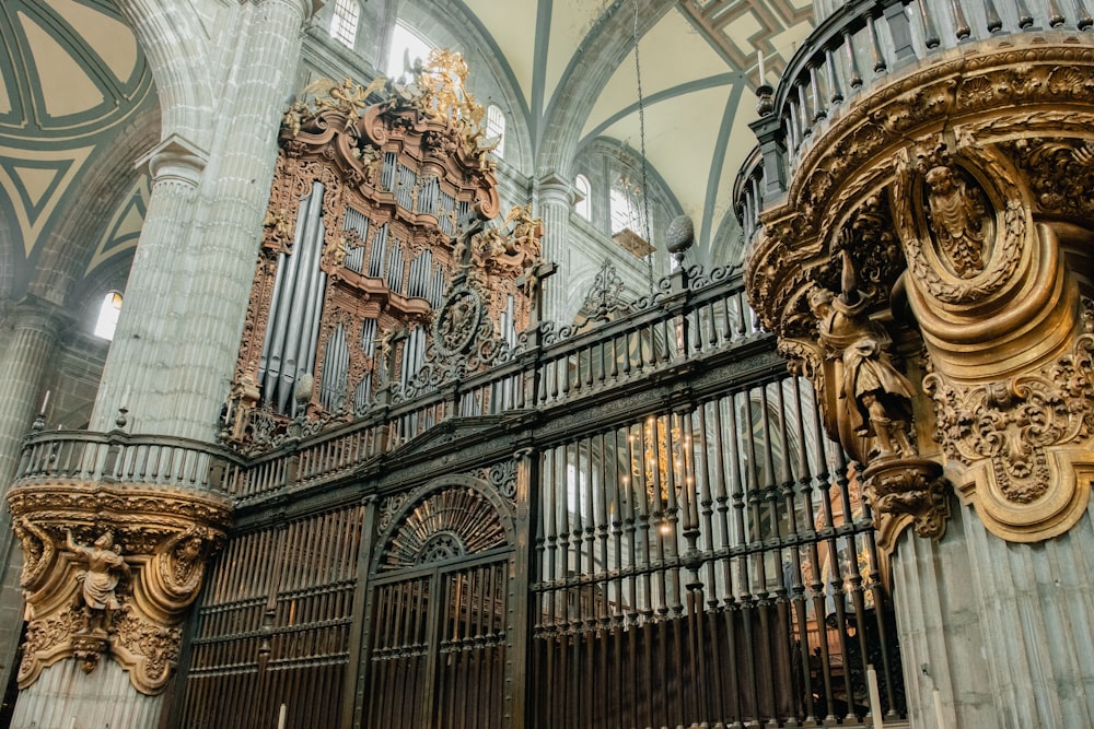 a large ornate building with a metal fence