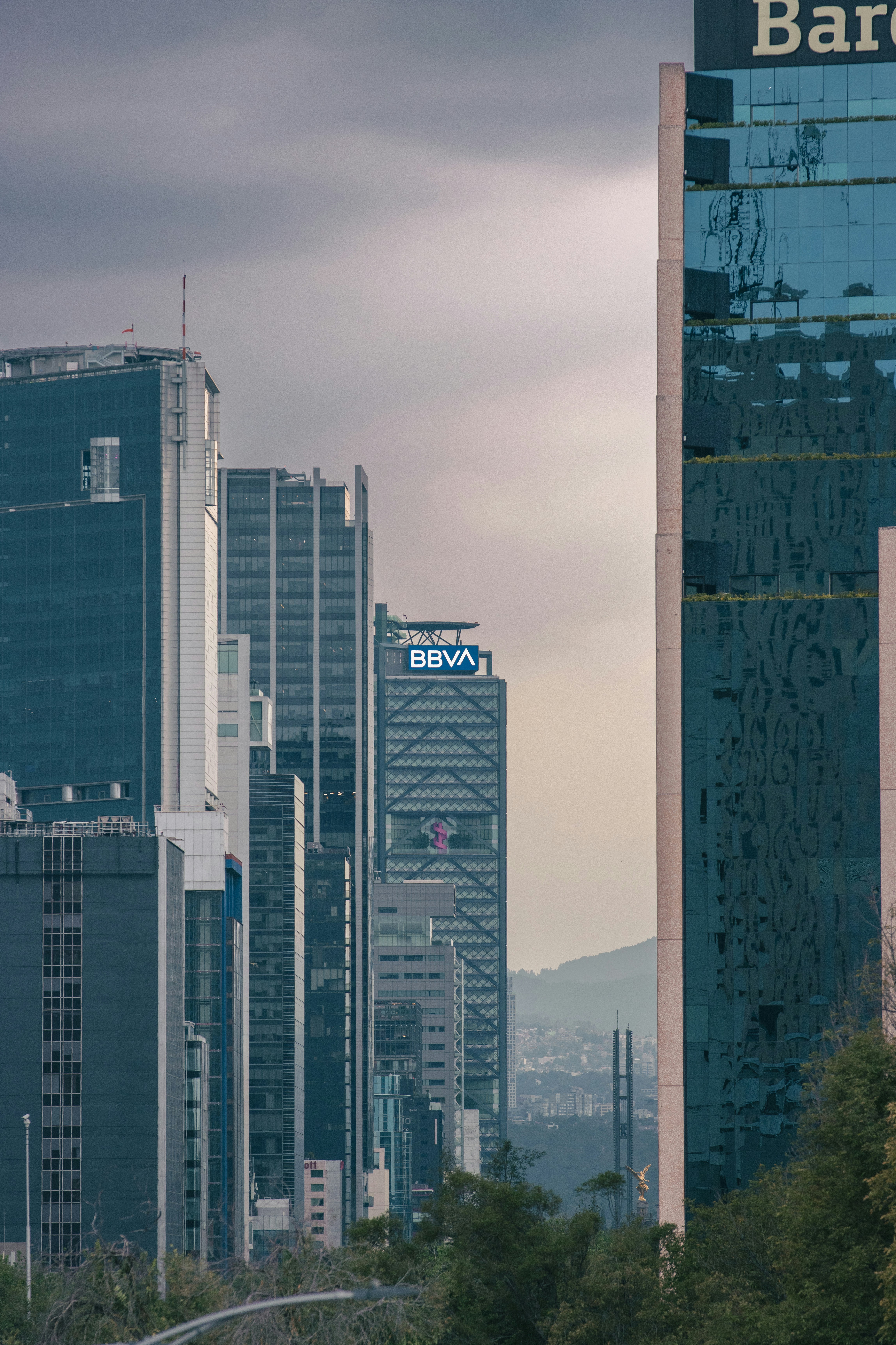 a view of a bunch of tall buildings in a city