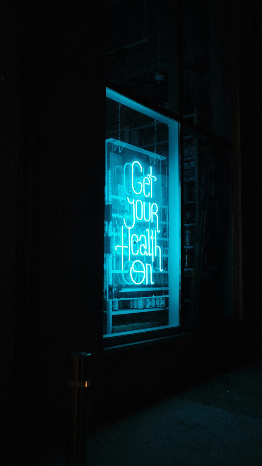 a neon sign that reads get your health on