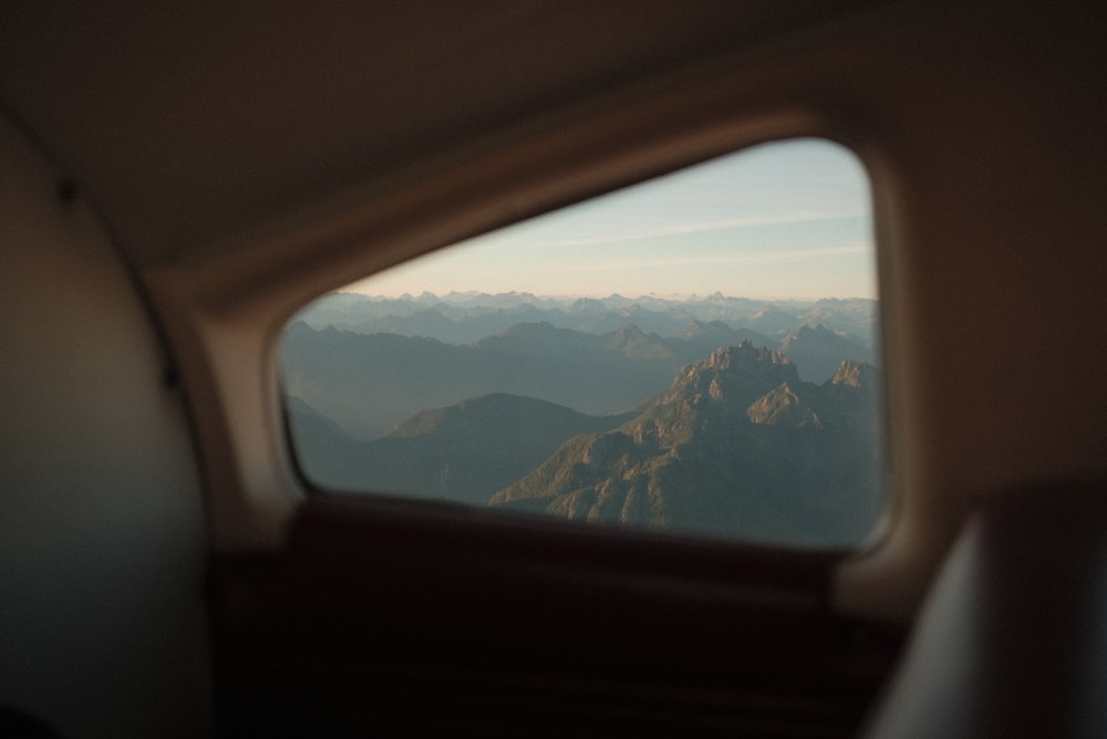 a view of mountains from a plane window