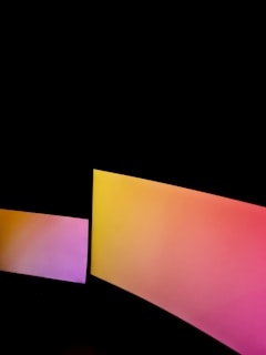 Abstract motion design animation frame with deep black background and subtle blue gradients.