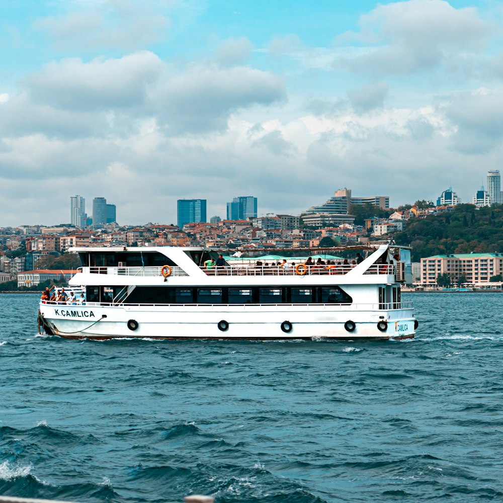 a large white boat in a large body of water