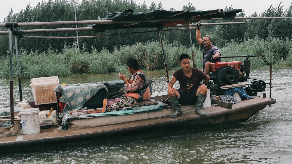 a group of people riding on the back of a boat