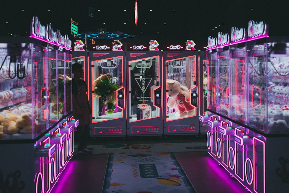 a room with a bunch of vending machines in it