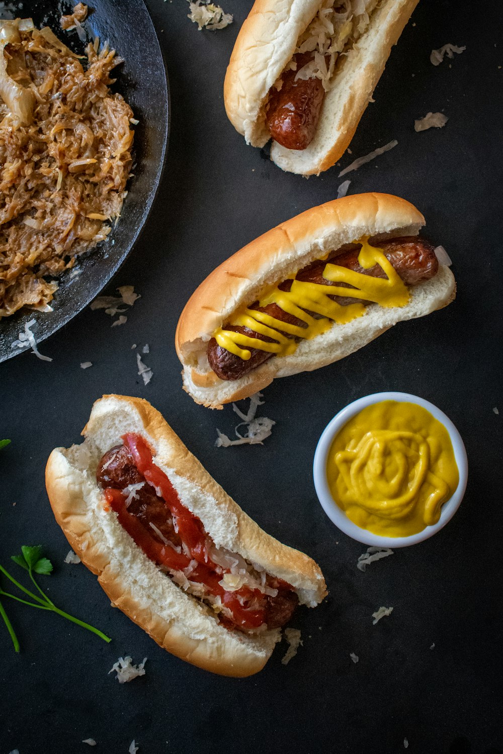 a couple of hot dogs sitting on top of a table