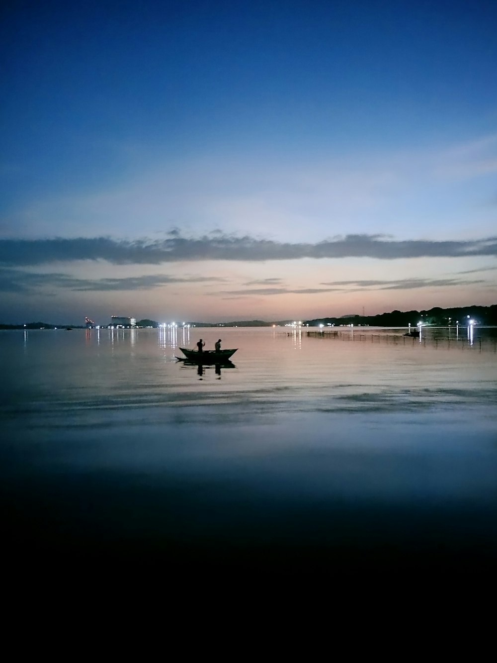 a person in a boat on a body of water