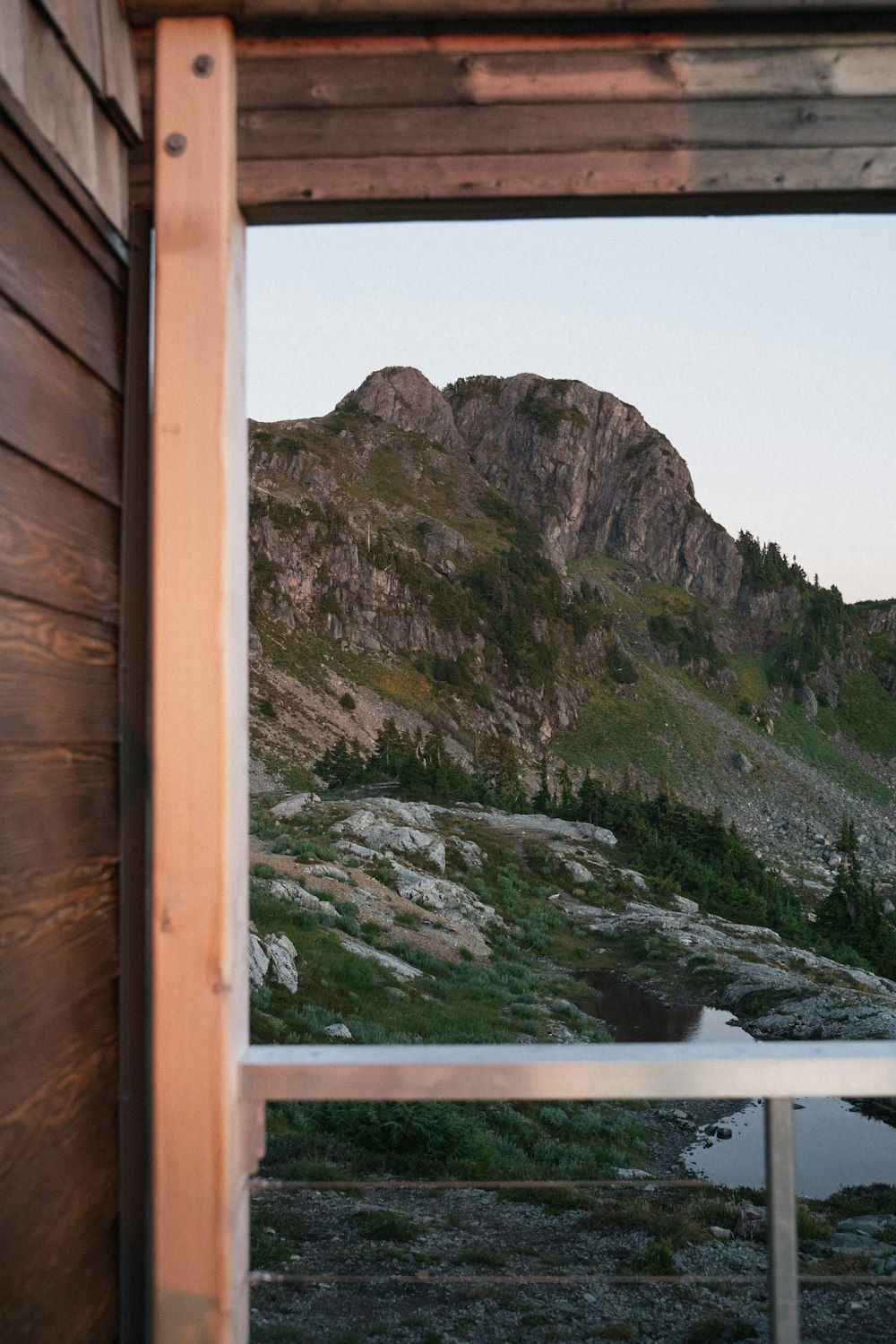 a view of a mountain through a window