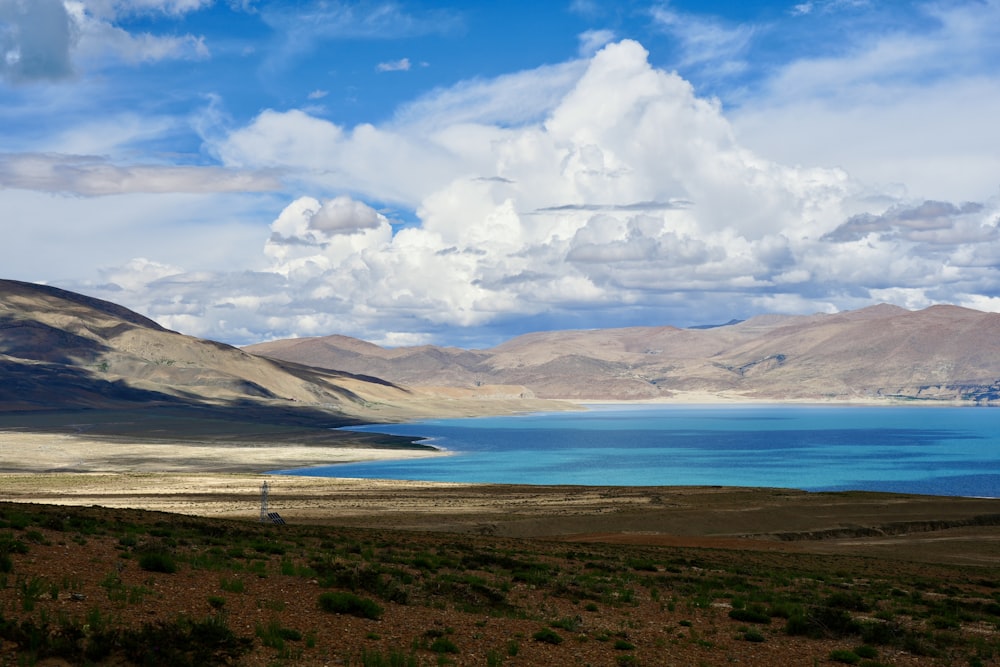 a large body of water surrounded by mountains