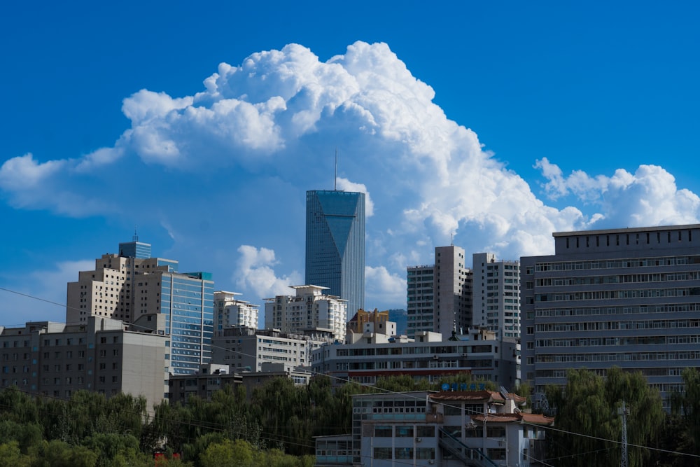 a very tall building towering over a city