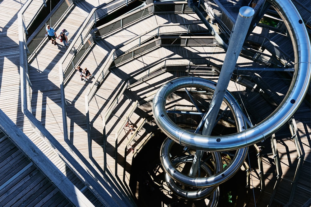 a large metal object on a wooden floor