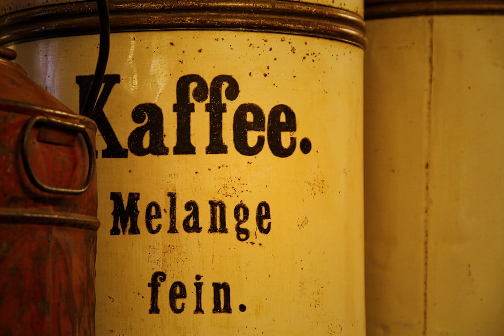 a close up of a canister with words on it