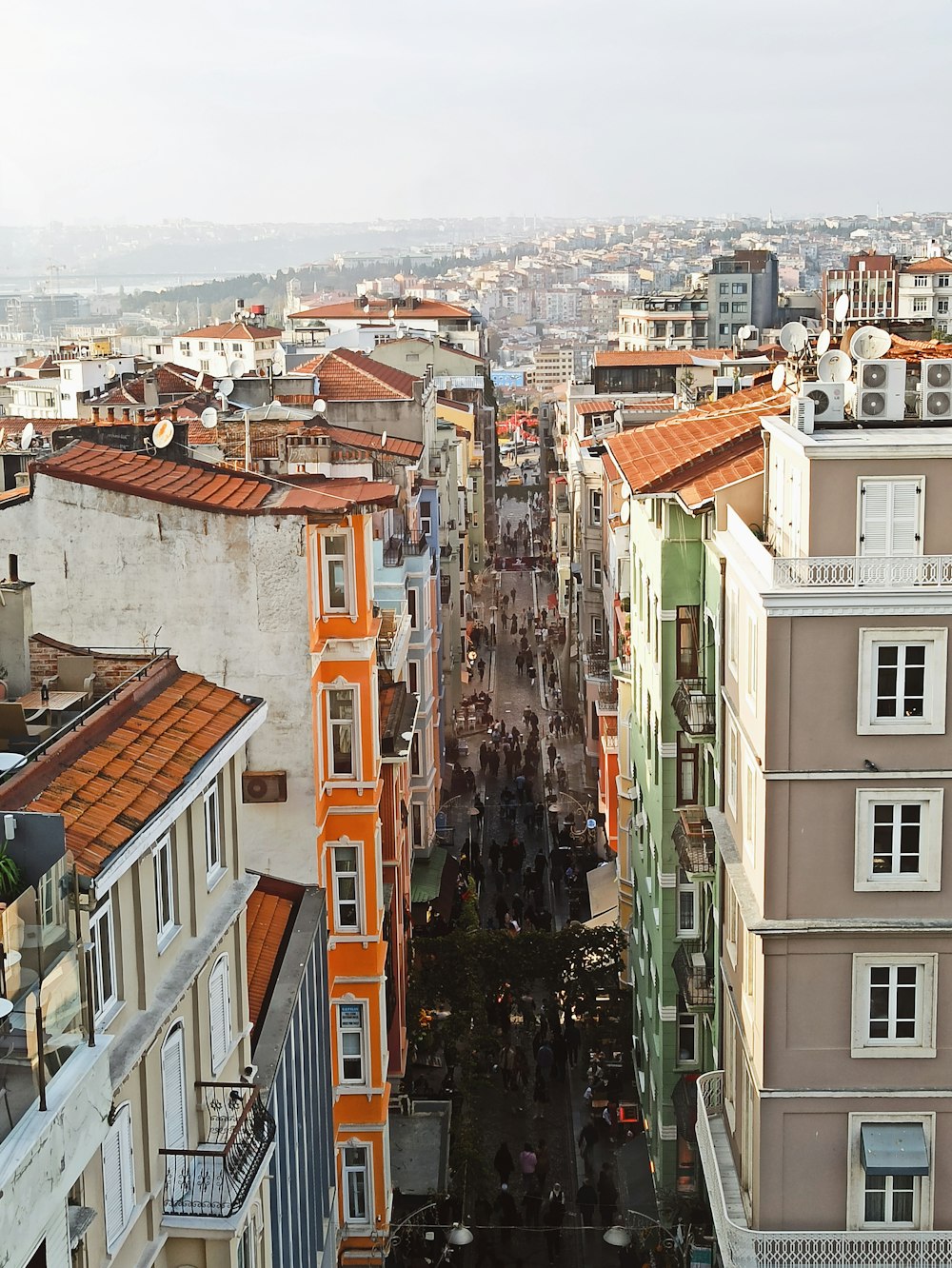 a city street filled with lots of tall buildings