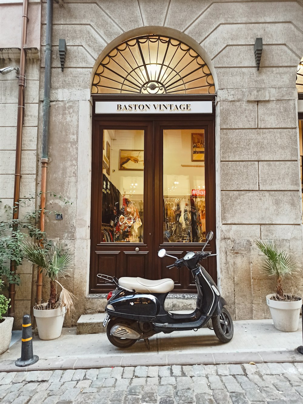 a scooter parked in front of a building