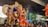 Devotees gathered around a traditional Durga idol during a vibrant festival celebration.