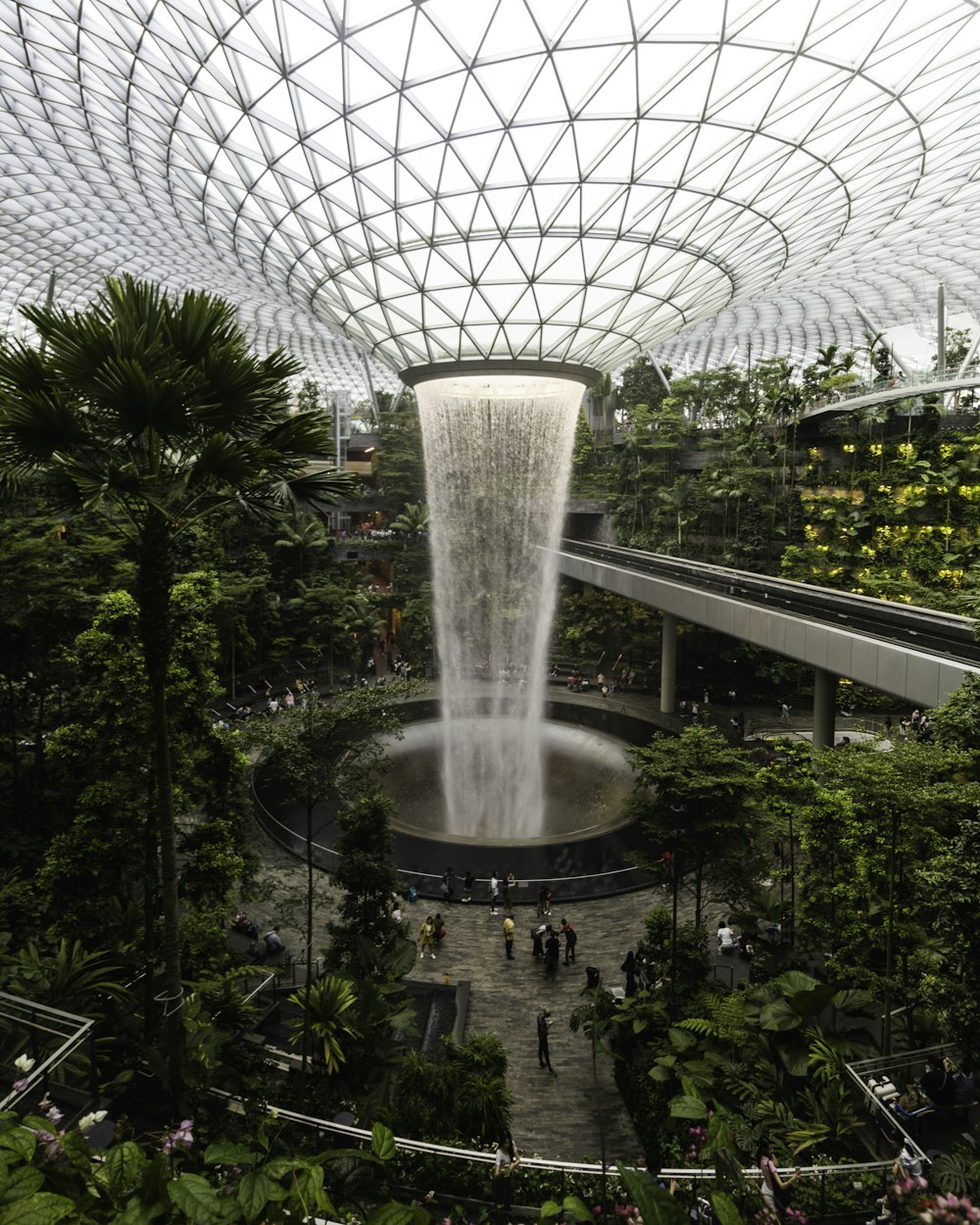 a large waterfall in the middle of a building