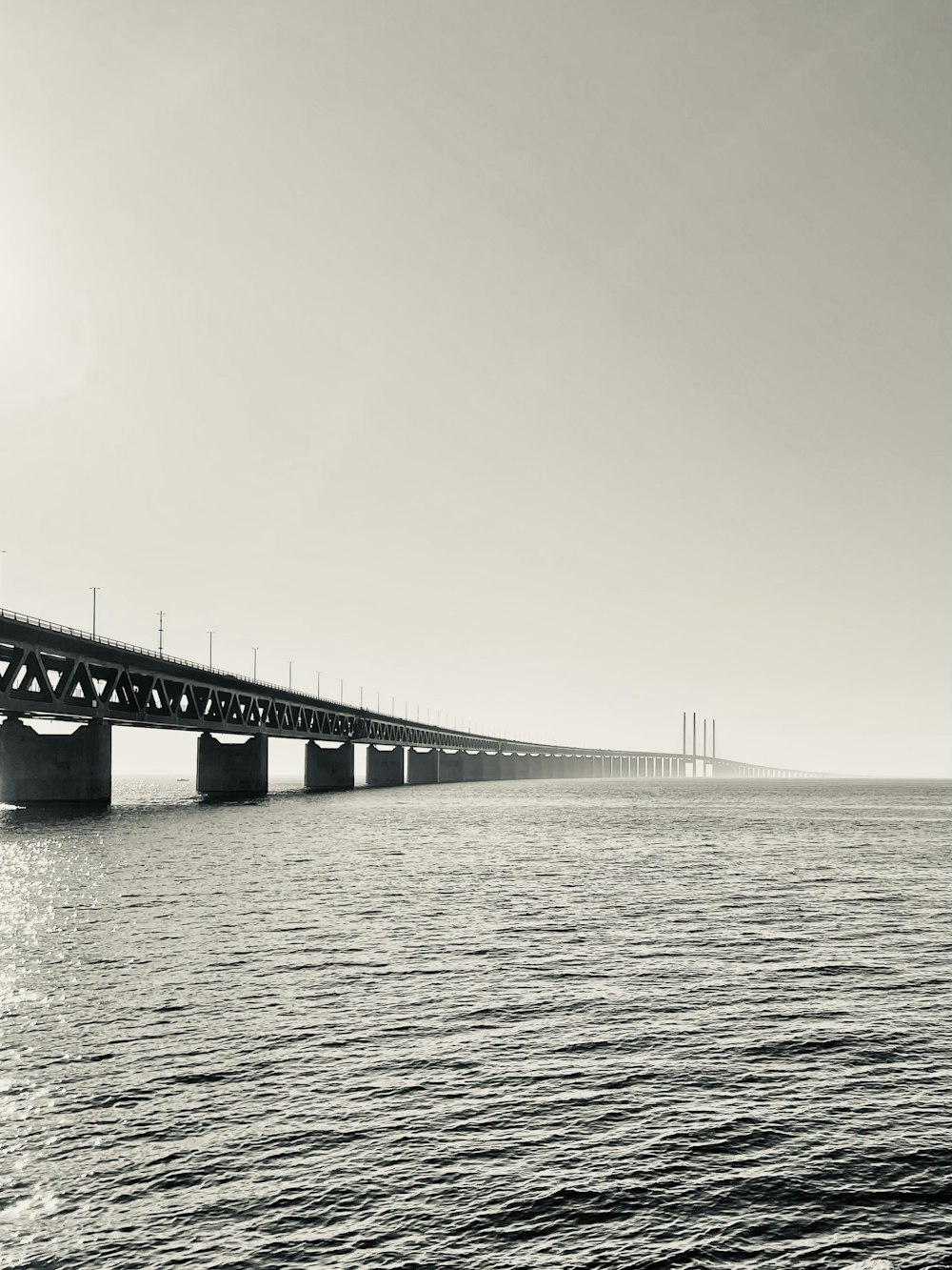 a long bridge over a large body of water