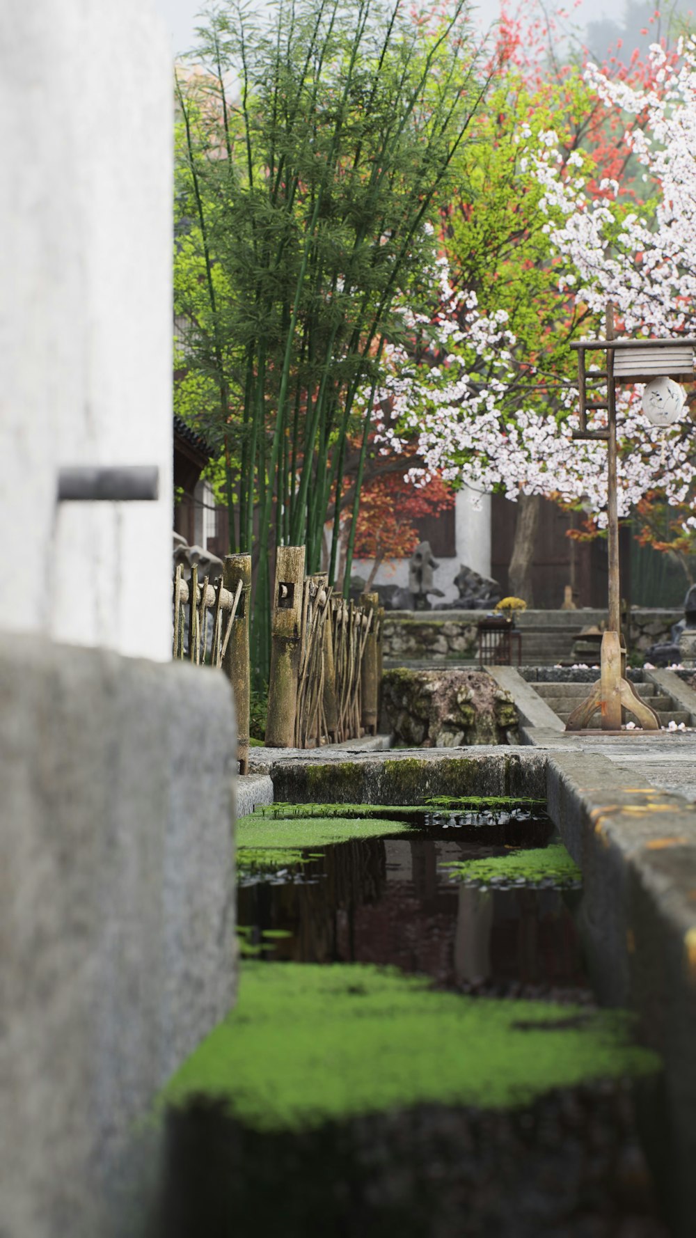 a person sitting on a bench in a park