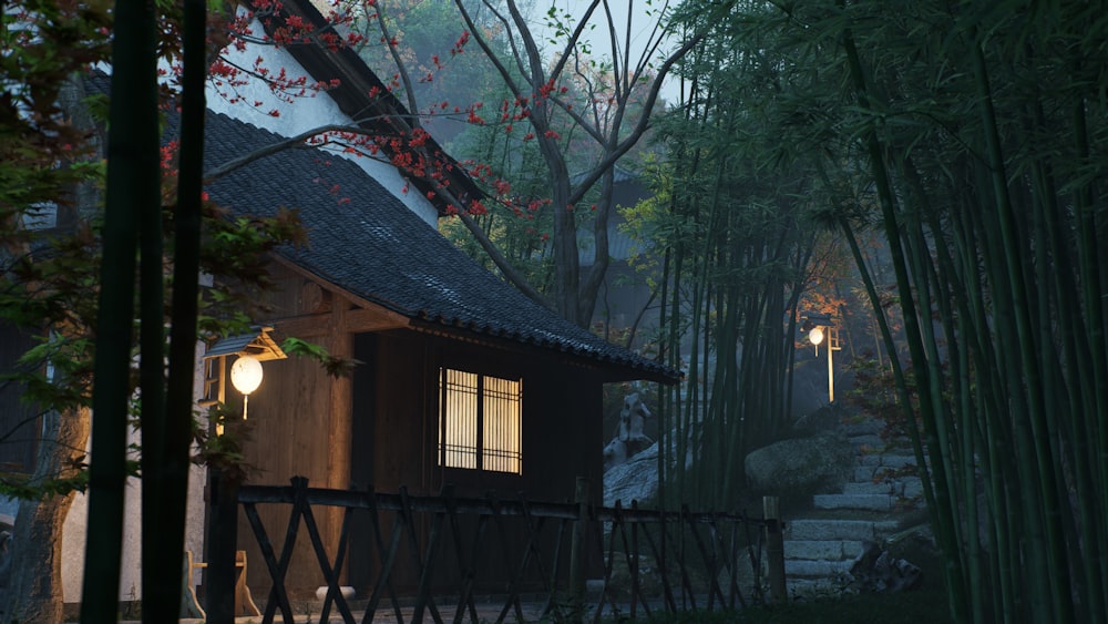 a house in the middle of a bamboo forest