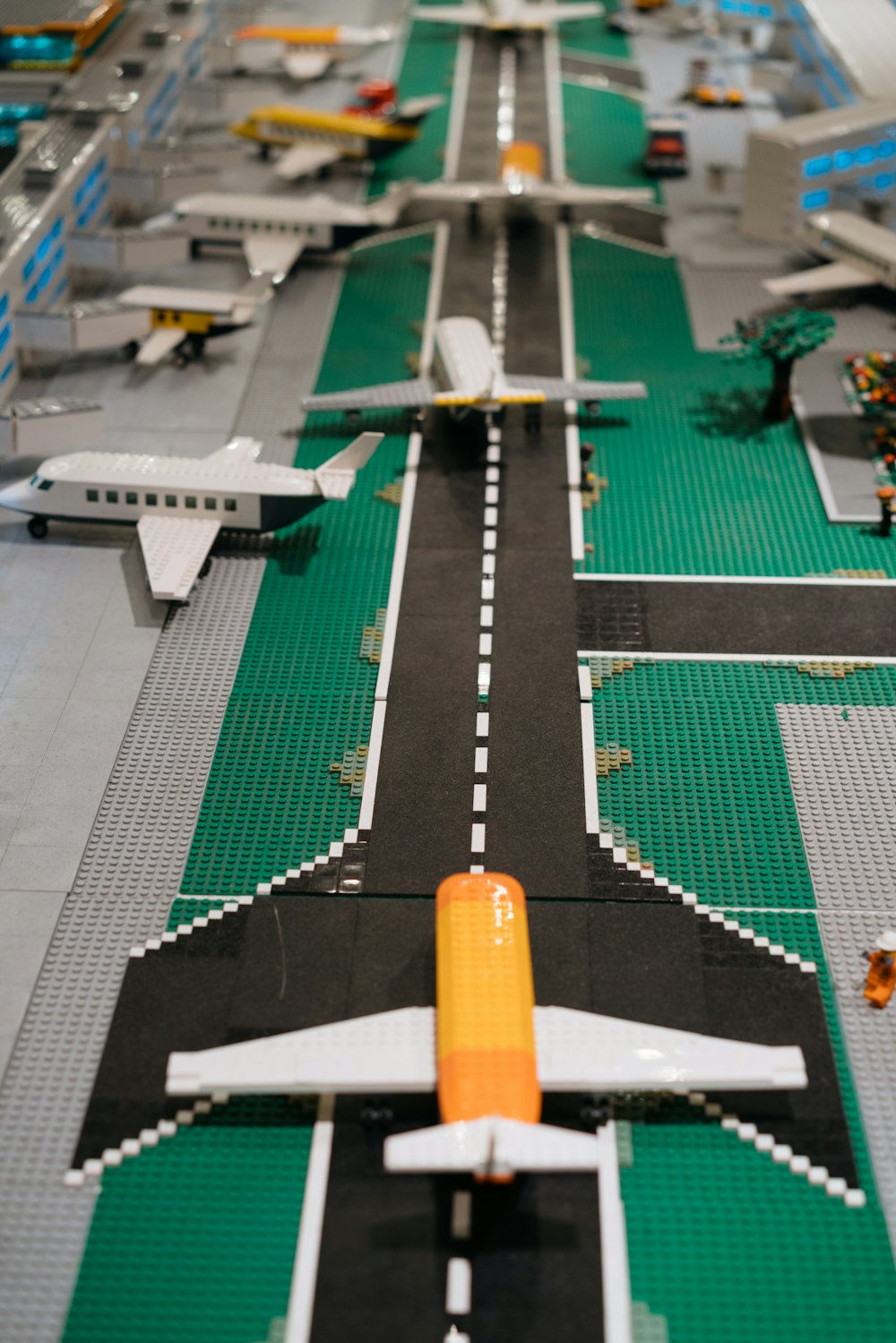 a model of an airplane on a runway