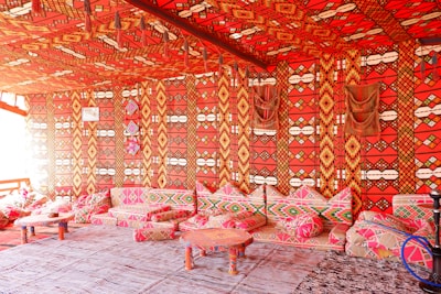 Modern Moroccan interior design with warm colors and traditional patterns.