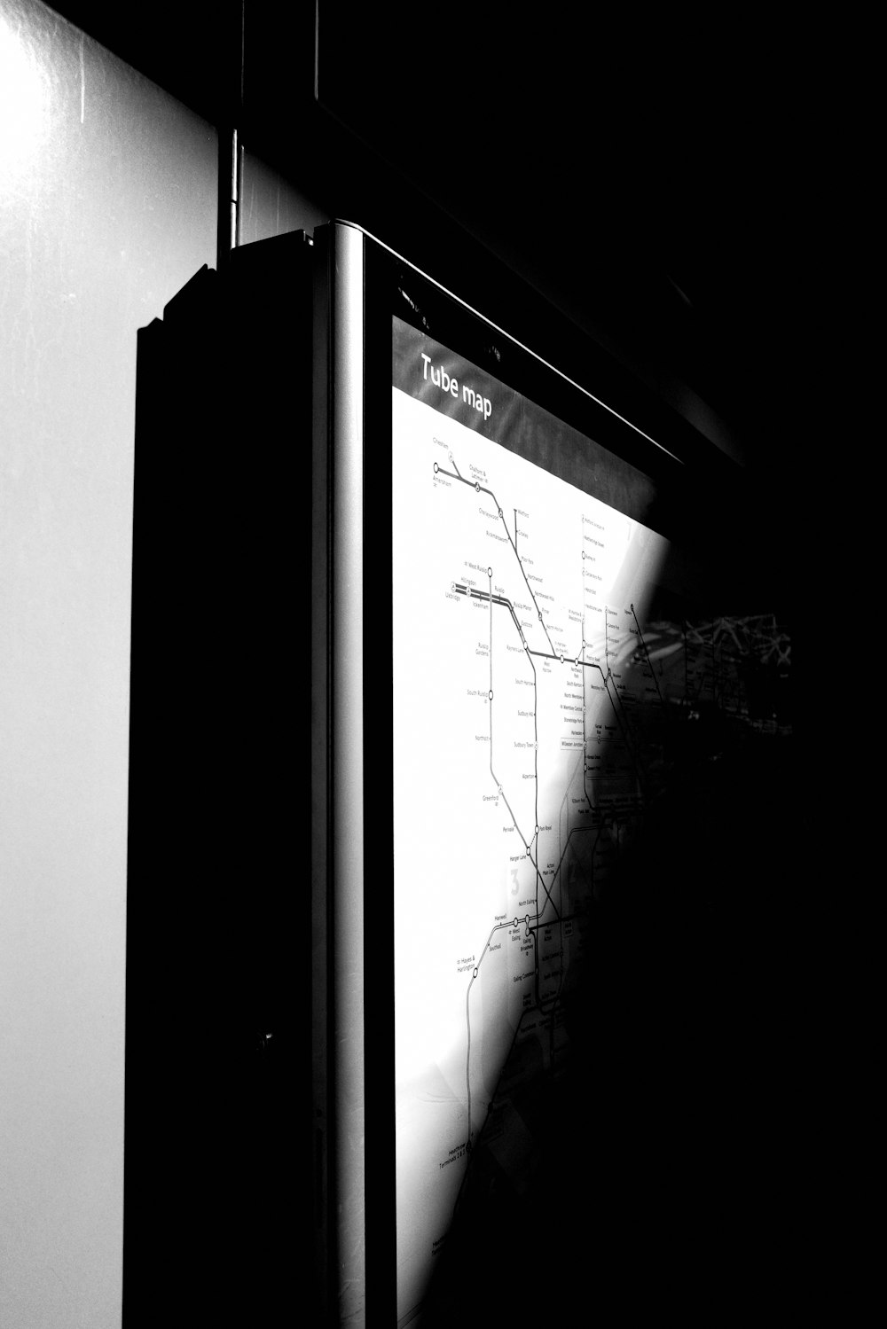 a black and white photo of a subway map