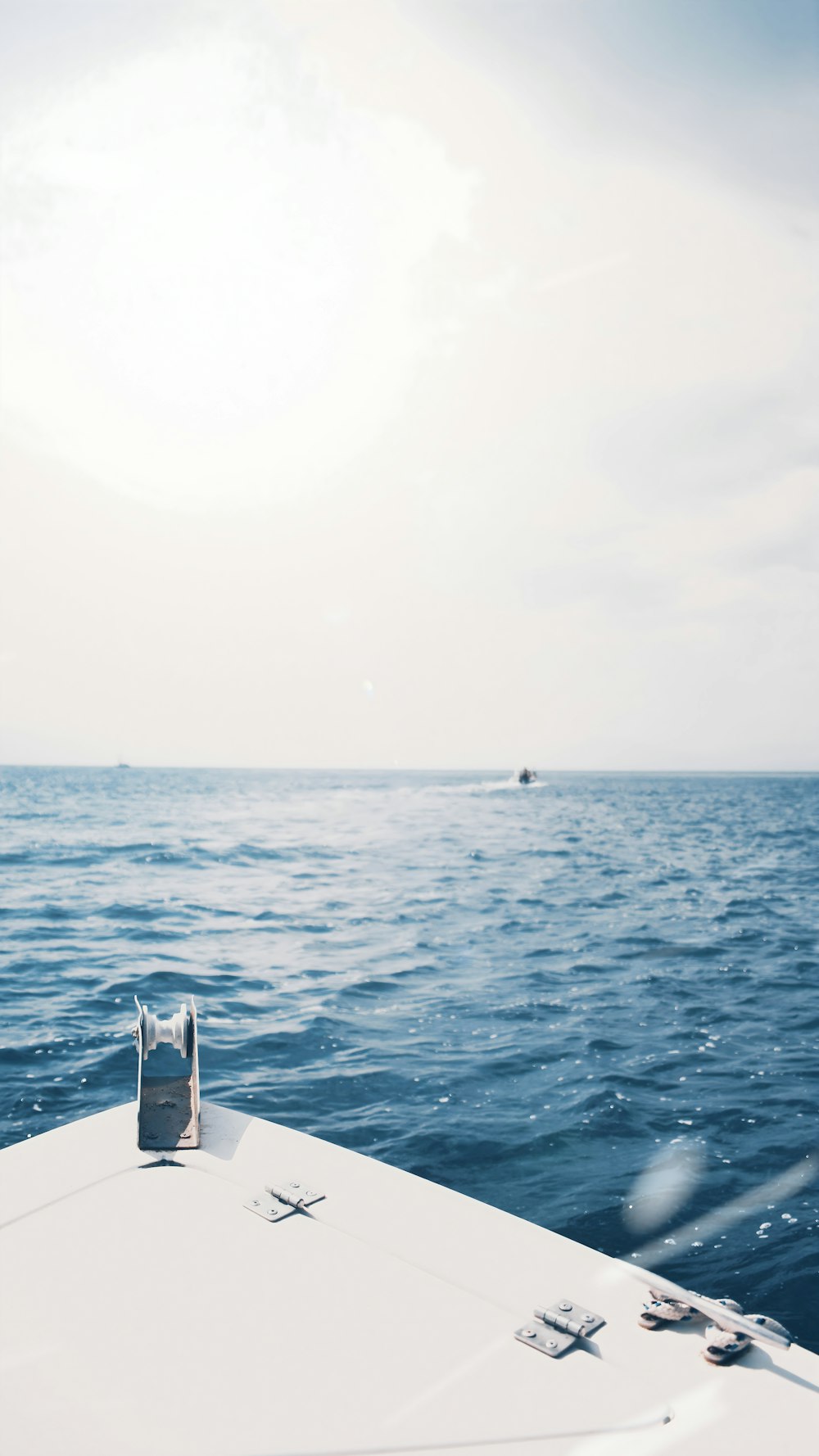 a bag sitting on top of a boat in the ocean