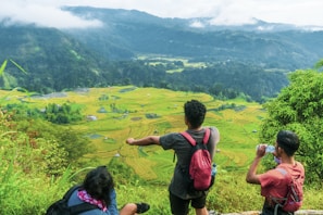 A group of travelers enjoying a scenic mountain view in Java during a Bamboo Tour trip.