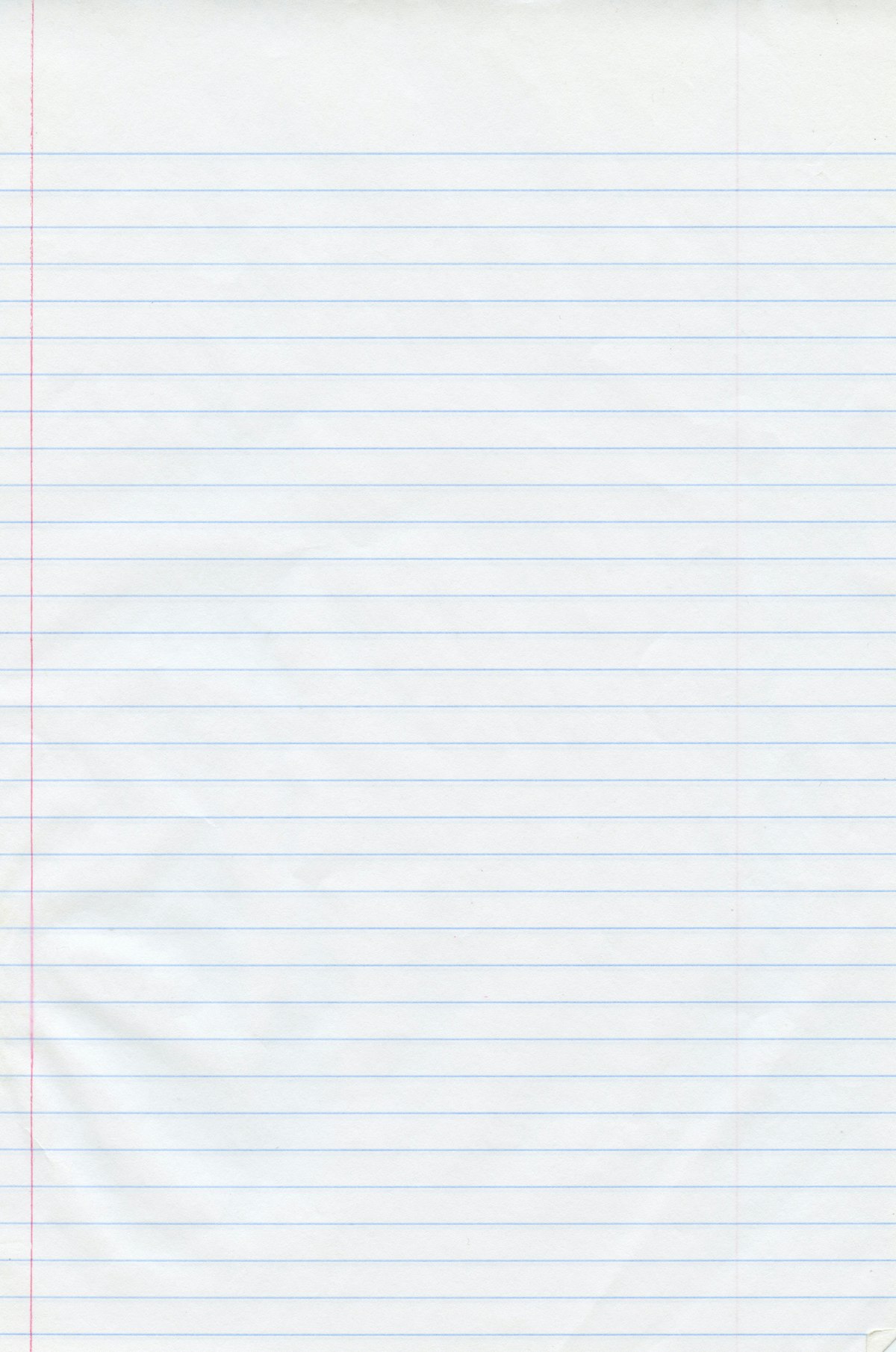 Close-up of red-lined notebook paper waiting to be written on