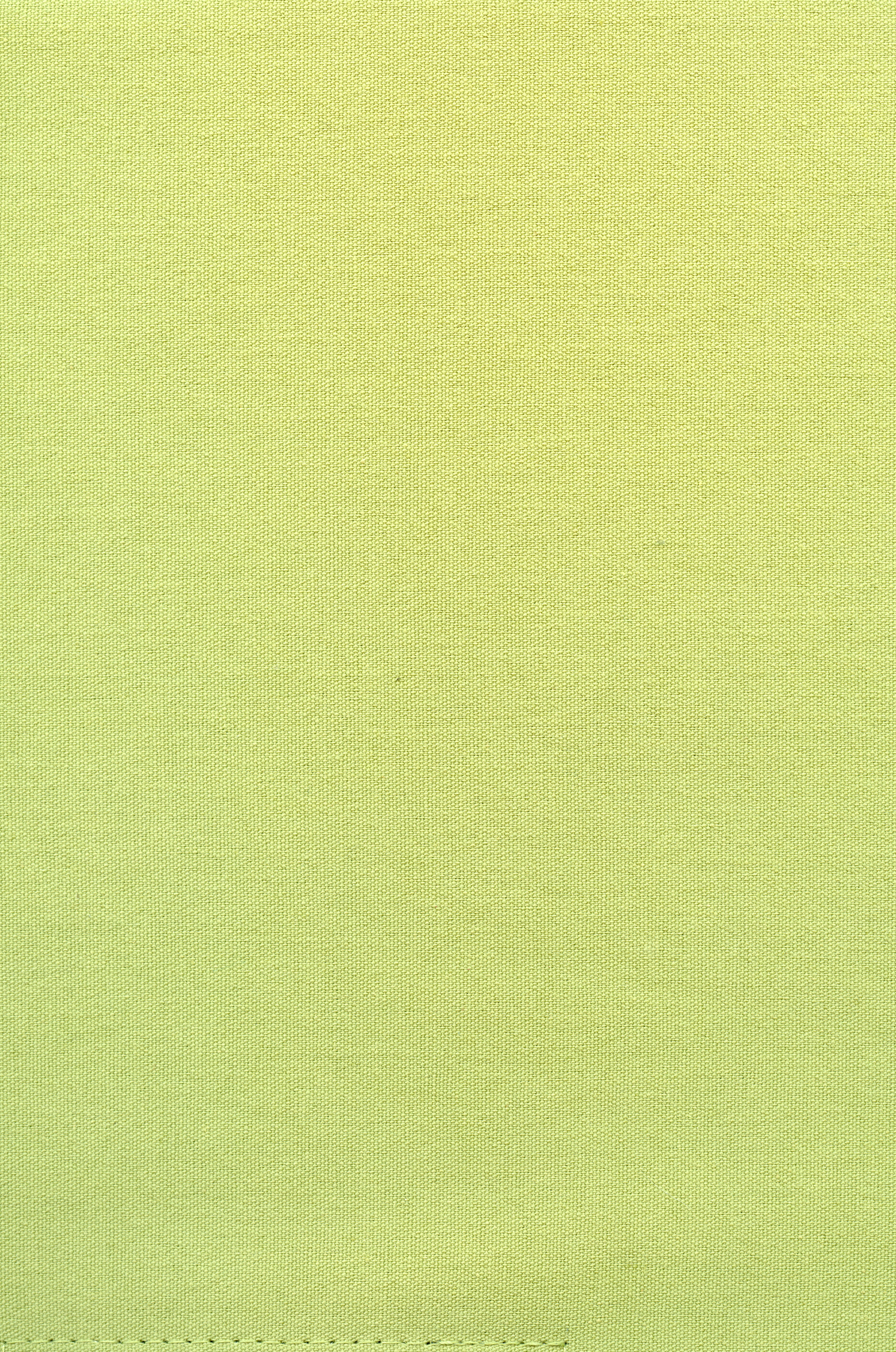 a close up of a yellow cloth texture