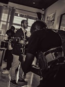 Behind-the-scenes photo of photographers capturing candid moments at an event.