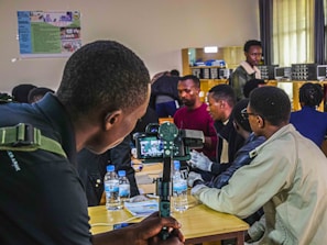 Photo capturing a group discussion during a workshop with diverse professionals