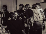 A black and white photo of a creative branding workshop in progress.