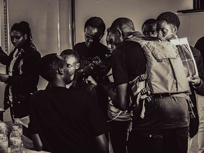 An engaging workshop with participants learning photography techniques.