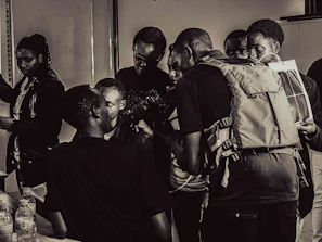 A lively photography class in session with attentive students and instructor.