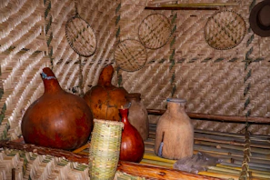 Natural clay pottery and woven baskets decorating the room’s peaceful corners.