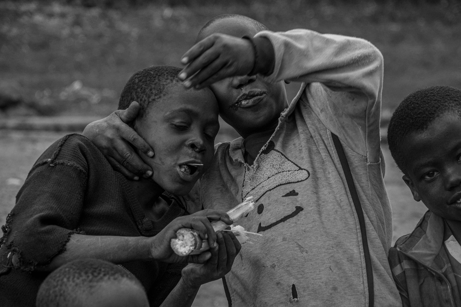 Children enjoying a fun moment while watching family videos.