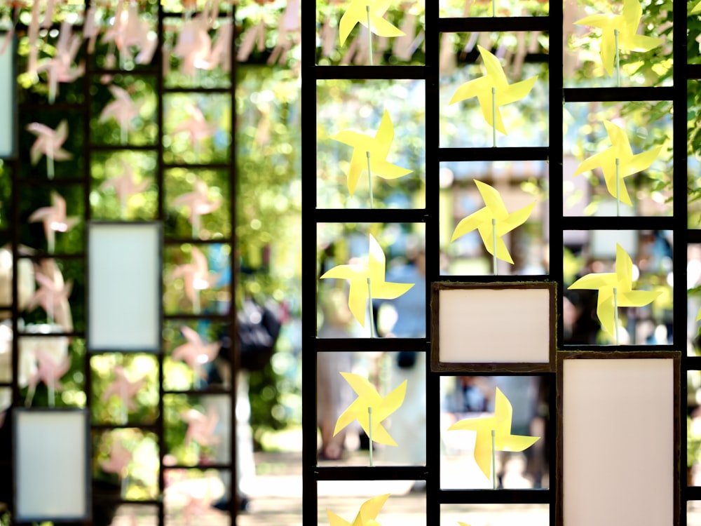 a group of mirrors with yellow stars on them