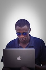 A professional team working on Apple developer accounts.