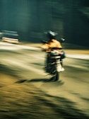 Speed lines blurring as a motorcycle accelerates.