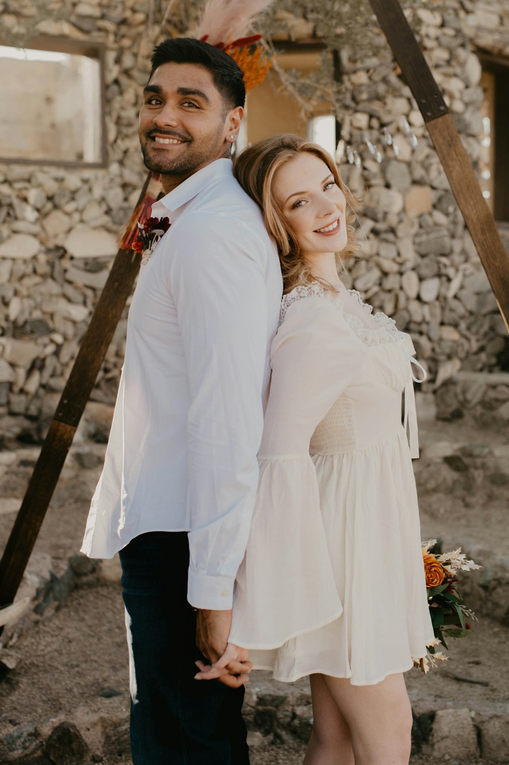 a man and a woman standing next to each other