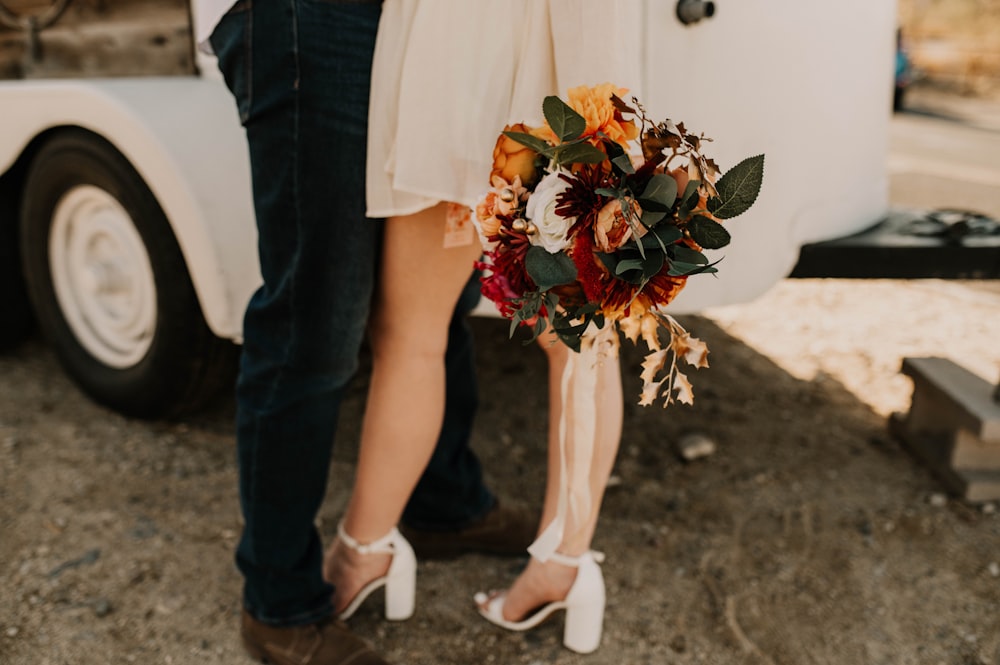 a man and a woman standing next to each other