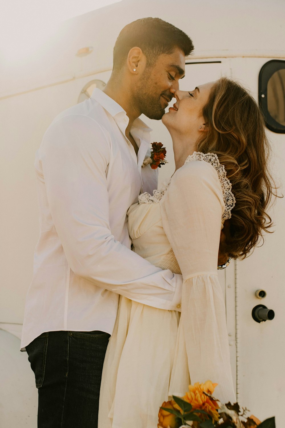 a man and a woman standing next to each other