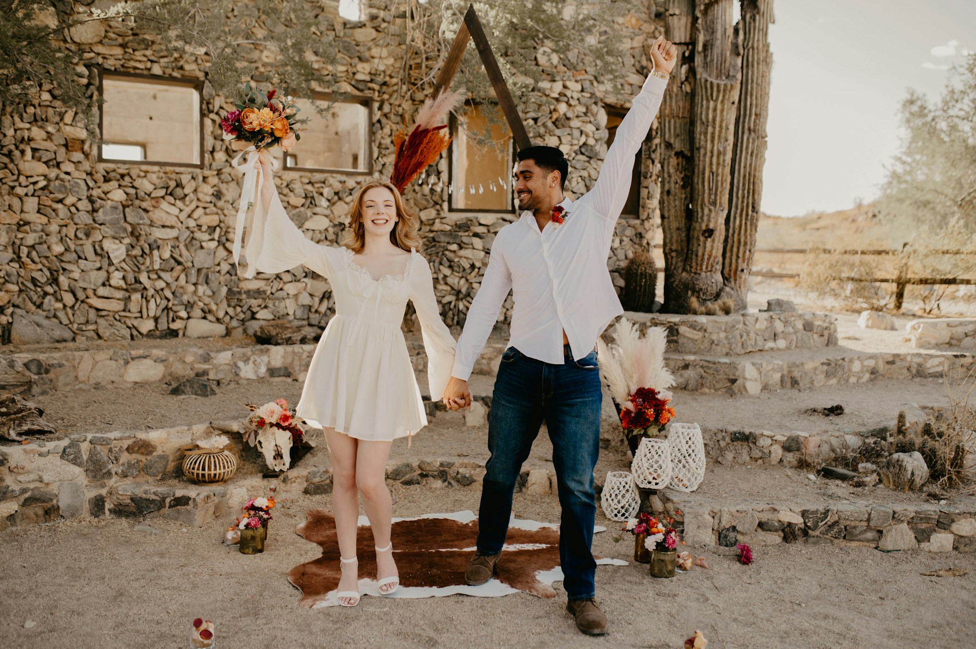 couple wearing silver-colored rings